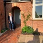 Jayne outside her house leaving for her Kathmandu trip