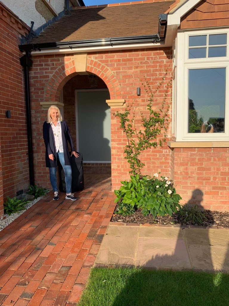 Jayne outside her house leaving for her Kathmandu trip