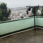 Balcony in rain bad weather in Asia