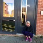 fitness over 50 Jayne sitting outside closed gym