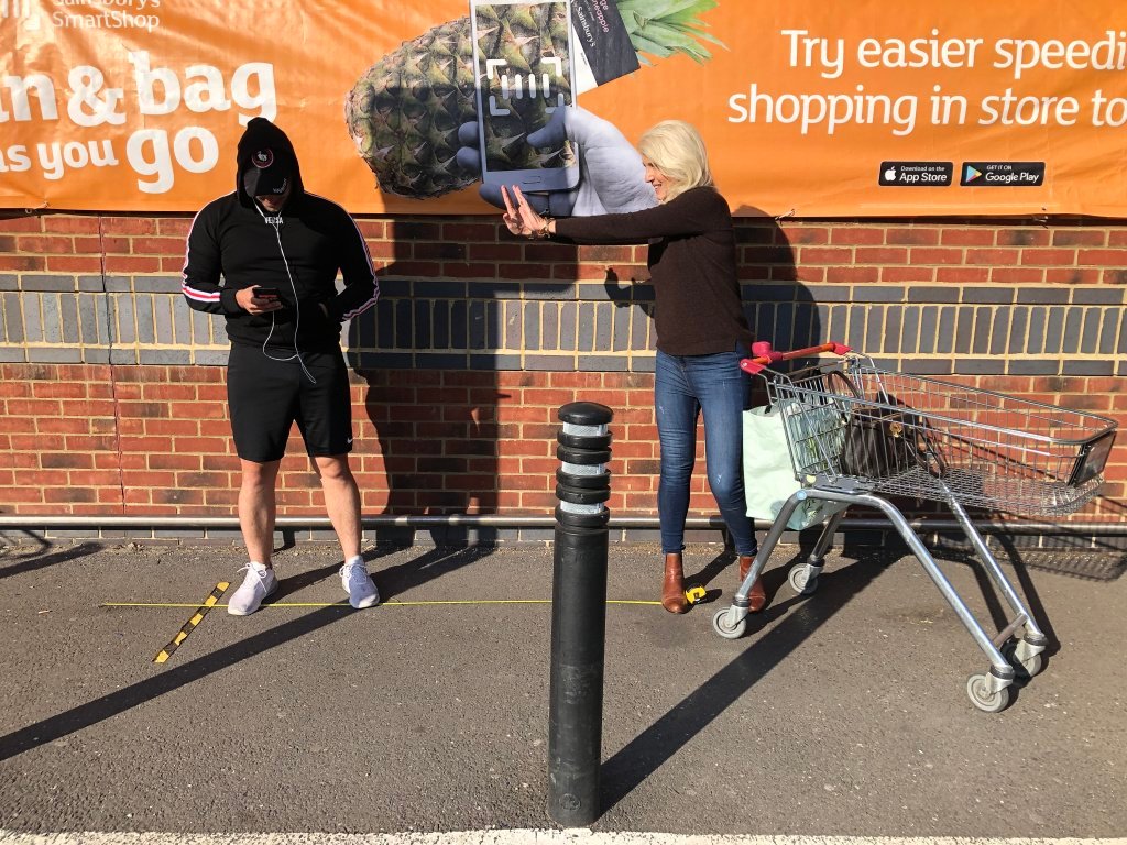 Jayne outside supermarket with supermarket trolley