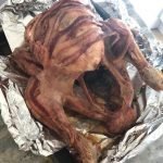 Roasted turkey in roasting tin