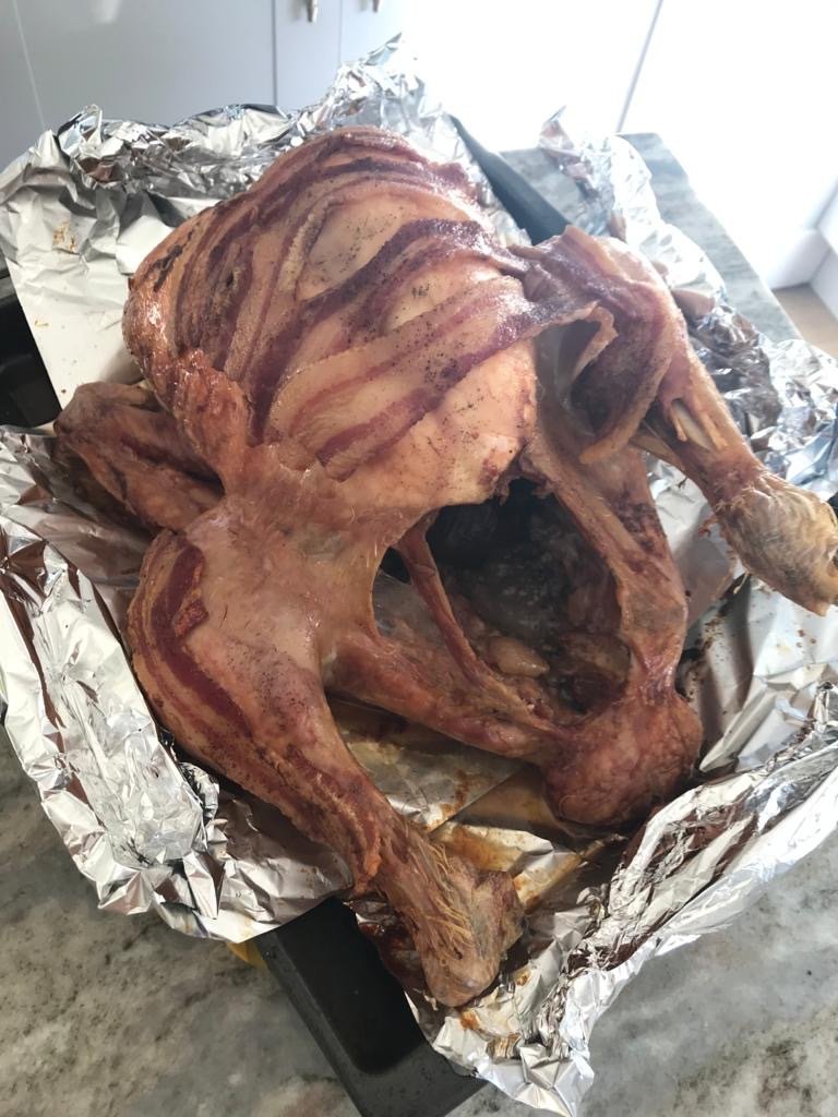 Roasted turkey in roasting tin